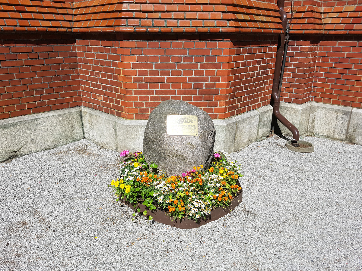 Memorial stone for the mass grave with soldiers from the Battle of Lund outside Norra Nöbbelöv church in Lund