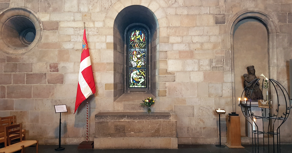 The Danish flag Dannebrog at Archbishop Anders Sunesen's grave in Lund Cathedral on June 15